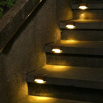 Zdjęcie produktu dla Zestaw 12 sztuk lamp solarnych do betonu, wodoodporne oświetlenie LED do schodów zewnętrznych, klatek schodowych, ogrodzeń, dziedzińców i ścieżek (ciepła biel)