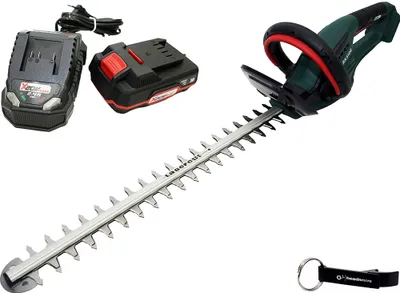 A cordless hedge trimmer with two batteries and a charger, along with a keychain, displayed on a white background.