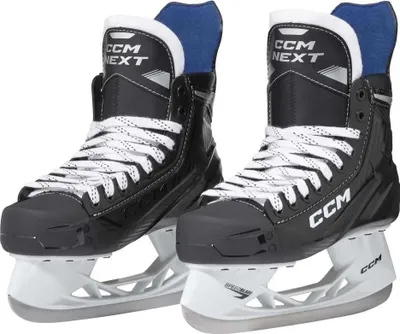 A pair of black CCM hockey skates with white laces and blue lining, displayed on a white background.