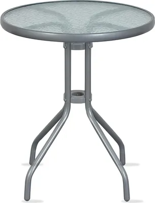 A round glass-top table with a metal base.
