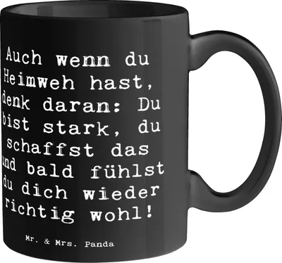 Produktbild von Mr. & Mrs. Panda Tasse Spruch Heimweh überwinden - Schwarz - Geschenk, cappuccinotasse, Geborgenheit, Becher, Kaffeebecher, Zuversicht, Mut, Geschenke, Trost, positivity