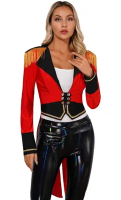 A woman wearing a red and black circus director-style jacket with gold fringe on the shoulders, and black shiny pants.