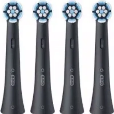 Four black toothbrush heads with blue and white bristles are arranged in a row against a white background.