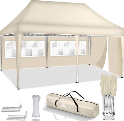 A beige pop-up canopy tent with three side walls, each featuring arched windows. Accessories like ropes, stakes, and a carrying bag are displayed in the foreground.