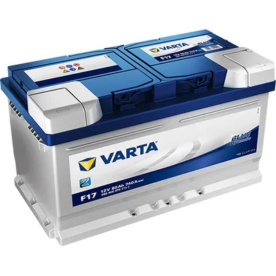 A Varta car battery is shown from a diagonal angle against a white background.