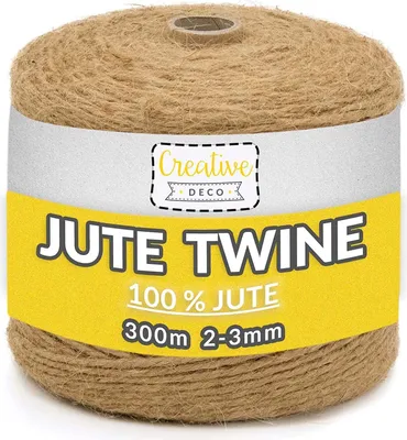 A roll of jute twine on a white background.