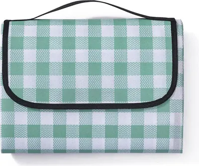 A folded picnic blanket with a green and white checkered pattern.