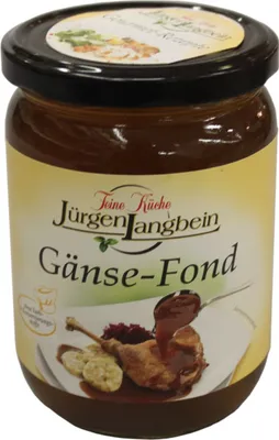 A jar of goose fond with a picture of a prepared dish on the label.