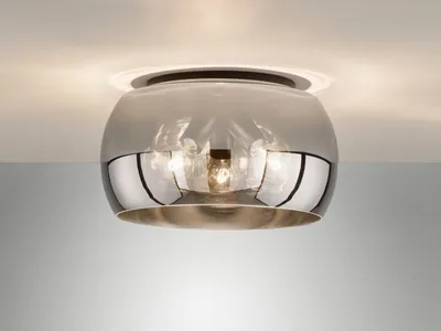 A close-up shot of a modern ceiling light fixture.