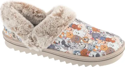 A single slipper with a dog print pattern and faux fur trim is shown against a white background.