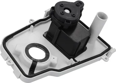 A close-up view of a washing machine component, likely a condenser pump assembly, is shown against a white background.