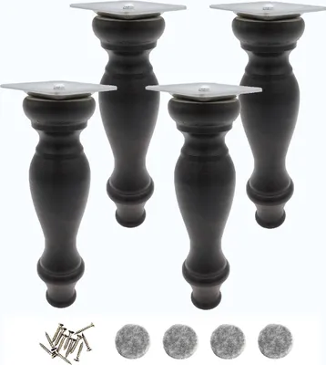 Four black wooden furniture legs with silver mounting plates are displayed against a white background. A small pile of screws and four felt pads are also visible at the bottom.