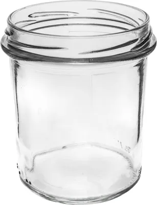 A clear glass jar with a threaded rim for a lid.