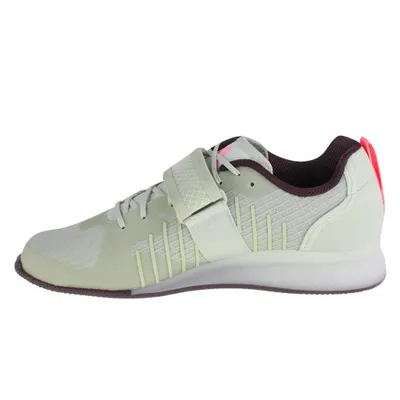 A side view of a single athletic shoe against a white background.