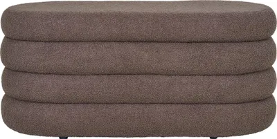 A close-up, front-facing view of a brown upholstered ottoman with a textured fabric and a layered design.