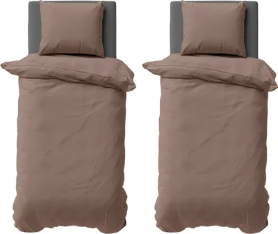 Two identical beds with bedding are shown side-by-side.