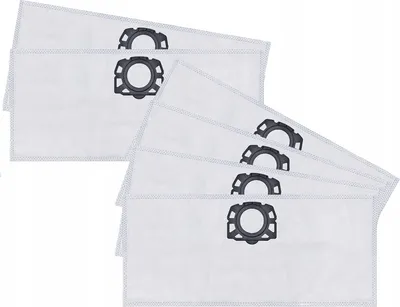 A stack of white vacuum cleaner bags with black plastic connectors.