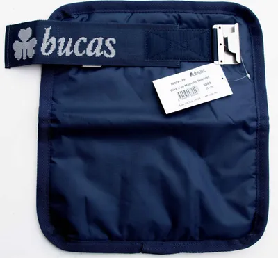 A close-up view of a navy blue Bucas Extender Click'n Go Magnetic Brustverlängerer with a tag attached.