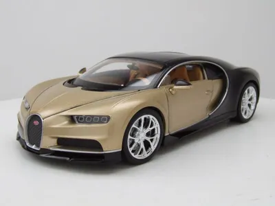 Produktbild von Welly 24077G Bugatti Chiron 2017 gold schwarz 1:24