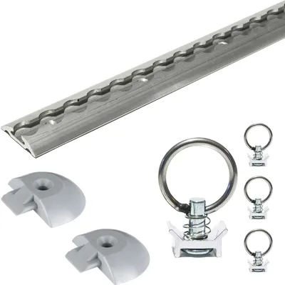 A set of tie-down track hardware including a section of track, end caps, and tie-down rings with fittings.