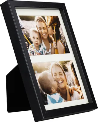 A black multi-photo frame with two pictures of a woman and children.
