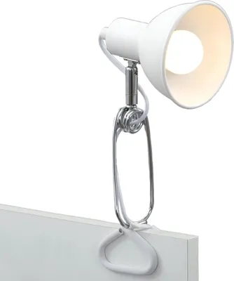 A white clip-on lamp with a silver clamp is attached to a white surface.