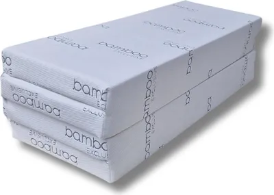 A stack of folded mattresses with a bamboo-exclusive pattern.