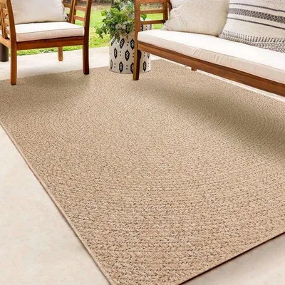 Imagen del producto de Alfombra Unyqoos® para interiores y exteriores, estilo yute, diseño circular en tonos naturales, resistente a la intemperie y a los rayos UV, 160 x 230 cm