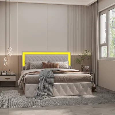 A modern bedroom with a bed featuring LED lighting.