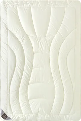 A white duvet or comforter laid flat, showing its quilted pattern.