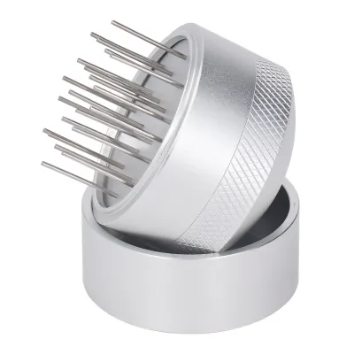 A silver coffee needle distributor tool with multiple needles.