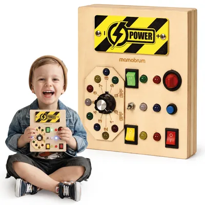Immagine prodotto di Pannello di controllo Mamabrum con luci LED colorate, manopola e interruttori, dimensioni 15,7 x 3 x 13 cm, realizzato in compensato e metallo, adatto a bambini dai 3 anni in su
