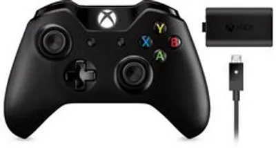 A black Xbox One wireless controller with its accessories, including a play and charge kit and a USB cable, is displayed against a white background.