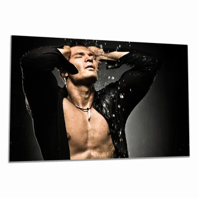 Produktbild von Wallario Herdabdeckplatte aus Glas, Größe 80 x 52 cm 1-teilig, Motiv Sexy Mann unter der Dusche