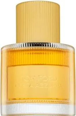 A close-up studio shot of a Tom Ford perfume bottle.