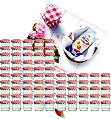 A collection of small glass jars with red and white checkered lids, along with a packet of jelly powder and some flowers.