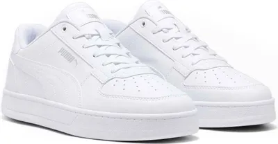 A pair of white Puma sneakers.