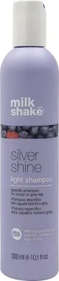 A product shot of a bottle of Milk_Shake Silver Shine Light Shampoo.