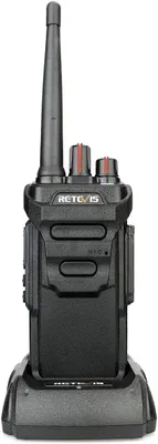 A black Retevis RT648 walkie-talkie is shown in a charging dock against a white background.