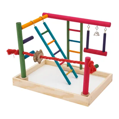 A colorful bird playground with ladders, swings, and a rope, set in a wooden tray.