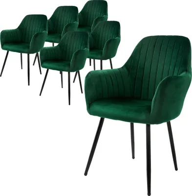 A set of six green velvet dining chairs with black legs, arranged on a white background.