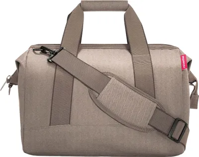 A studio shot of a duffel bag.