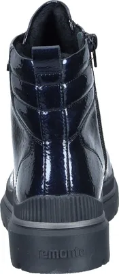 The back view of a dark blue patent leather boot with a black sole.