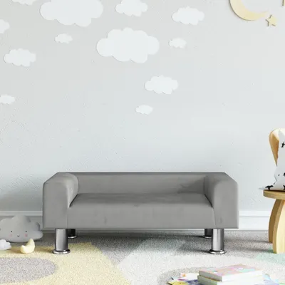 Imagen del producto de El sofá infantil "Living Store" en color gris claro, con dimensiones de 70x45x26,5 cm, tapizado en terciopelo