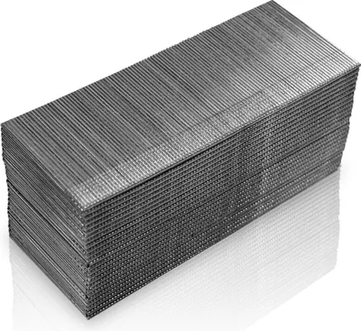A stack of metal nails on a reflective white surface.