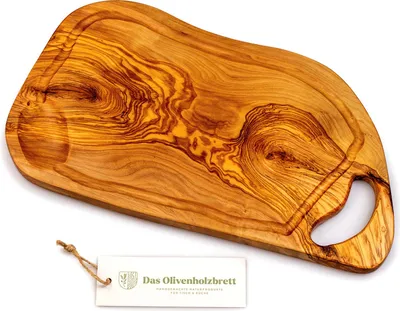 A wooden cutting board with a tag attached.