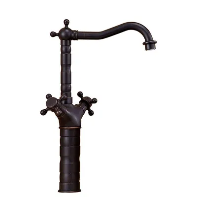 A close-up studio shot of a vintage-style faucet.