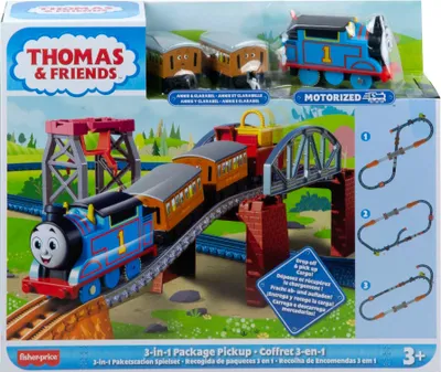 The image shows the packaging of a Thomas & Friends toy train set, featuring the train and track.