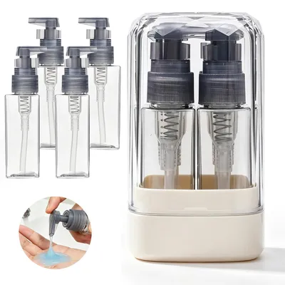 Produktbild von 4-teiliges Reiseflaschen-Set, 35 ml, wiederbefüllbar, transparent, inkl. Etiketten, kompakt, auslaufsicher, für Shampoo, Lotion & Gesichtspflege