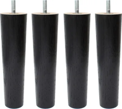 Four black wooden furniture legs with metal screws on top, arranged in a row against a white background.